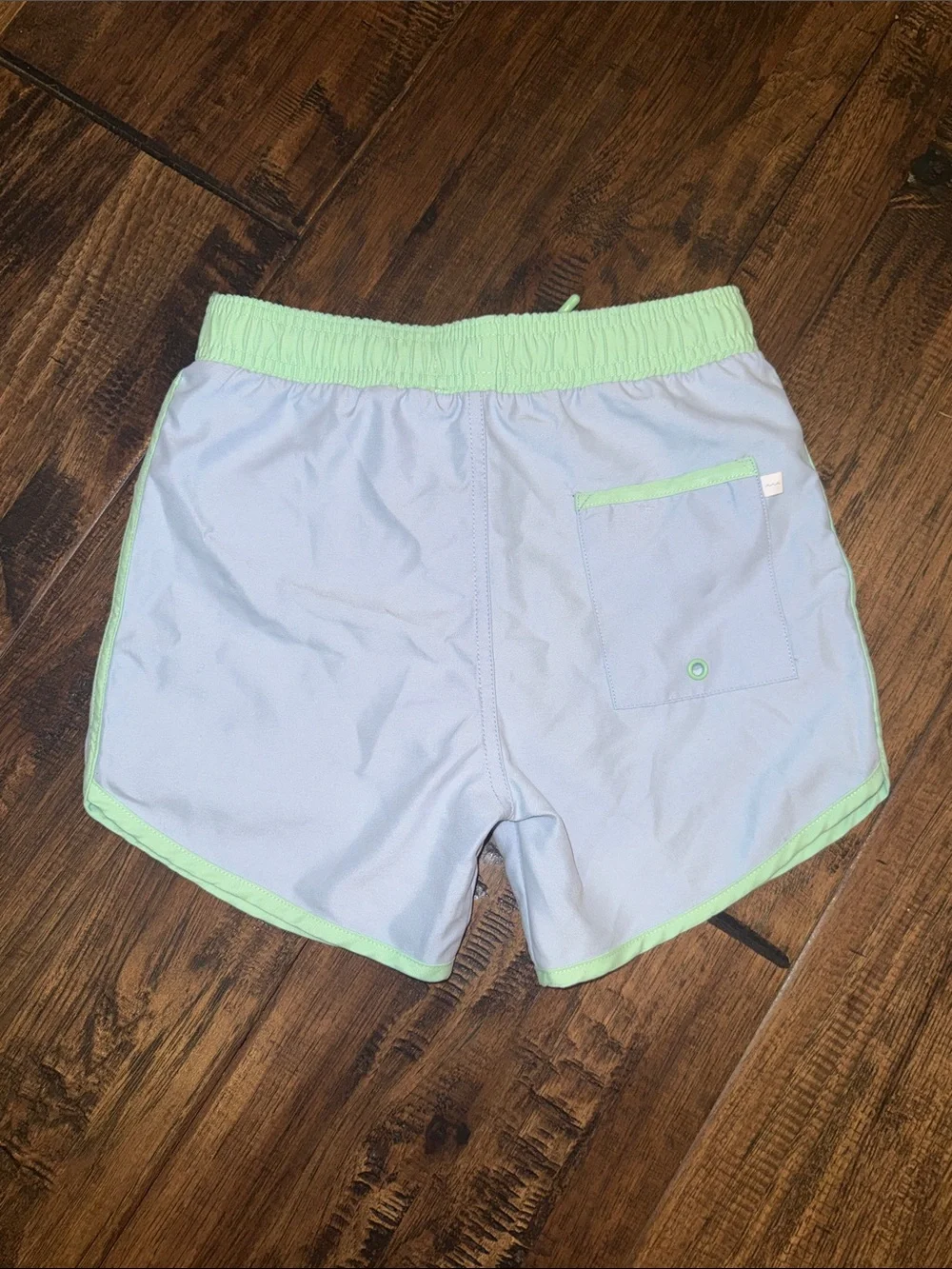 Minnow blue+green boardie. Size 9/10. NEVER WORN.